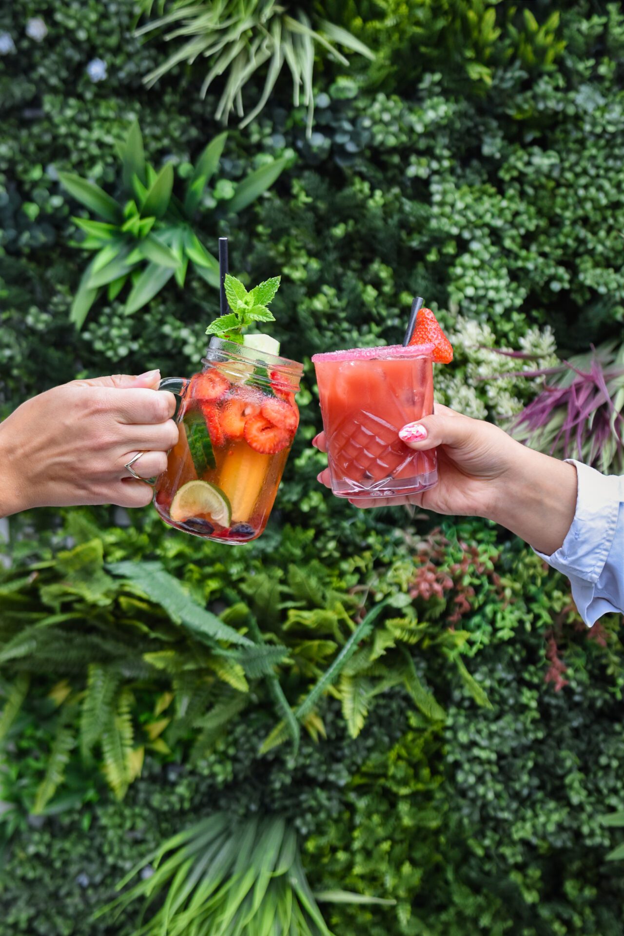 People Cheering with Cocktails