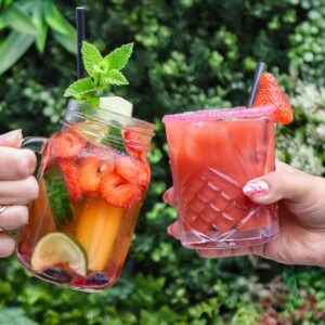 People Cheering with Cocktails